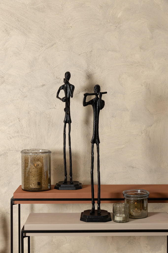 Beeld Kali met saxofoon